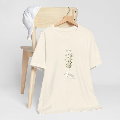 A t-shirt featuring a beautiful daisy for April with traits Purity, Innocence, Loyalty. Perfect for April birthdays and floral art lovers. Comfortable and stylish for casual outings or celebrations. Bella+Canvas 3001 t-shirt in natural. ReadyShirtAim.com