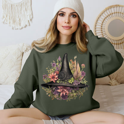 Gothic Boho Witch Hat & Flowers Halloween Sweatshirt for Women with a detailed witch hat and floral illustration. Perfect for Halloween celebrations. Available in multiple dark and light colors and sizes. Gildan 18000 sweatshirt in Military Green. ReadyShirtAim.com