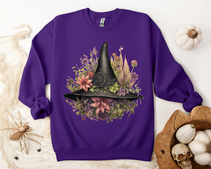 Gothic Boho Witch Hat & Flowers Halloween Sweatshirt for Women with a detailed witch hat and floral illustration. Perfect for Halloween celebrations. Available in multiple dark and light colors and sizes. Gildan 18000 sweatshirt in Purple. ReadyShirtAim.com