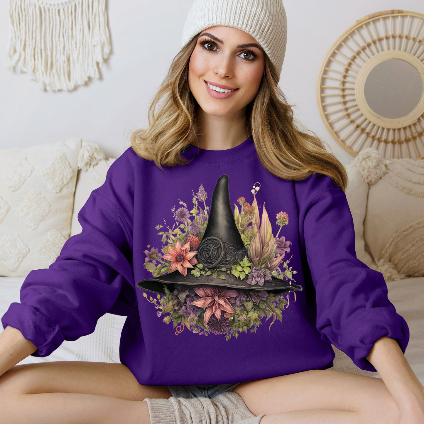 Gothic Boho Witch Hat & Flowers Halloween Sweatshirt for Women with a detailed witch hat and floral illustration. Perfect for Halloween celebrations. Available in multiple dark and light colors and sizes. Gildan 18000 sweatshirt in Purple. ReadyShirtAim.com