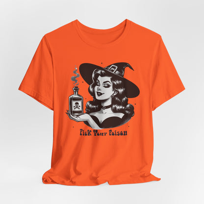 "Pick Your Poison" Vintage 1950's Witch Halloween Women's T-Shirt featuring bold black text and a classic black-and-white image of a pin-up girl in a sexy witch costume, gazing at a large, steaming potion bottle with a skull and crossbones on it, perfect for adding a retro touch with mystical charm to your Halloween festivities. Available in multiple colors and sizes.  Bella+Canvas 3001 t-shirt in orange. ReadyShirtAim.com