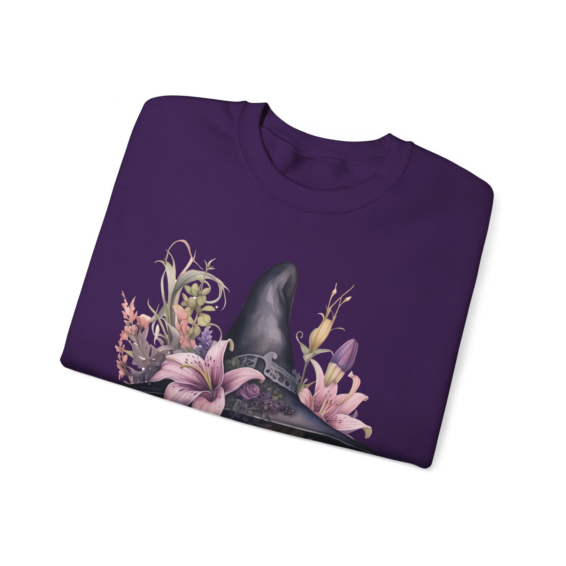 Charming Witch Hat & Flowers Sweatshirt with a watercolor illustration of a black witch hat and flowers in purple, pink, and green. Available in multiple dark and light colors and sizes. Gildan 18000 sweatshirt in Purple. ReadyShirtAim.com