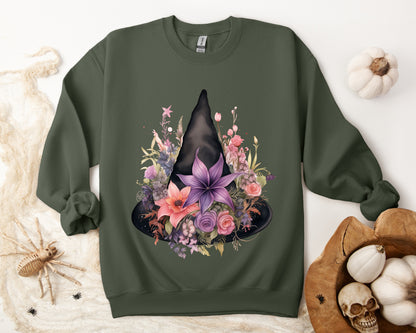 Feminine Witchy Vibes Boho Halloween Sweatshirt for her, featuring a watercolor illustration of a black witch hat and flowers in purple, pink, and green. Available in multiple dark and light colors and sizes. Gildan 18000 sweatshirt in Military Green. ReadyShirtAim.com