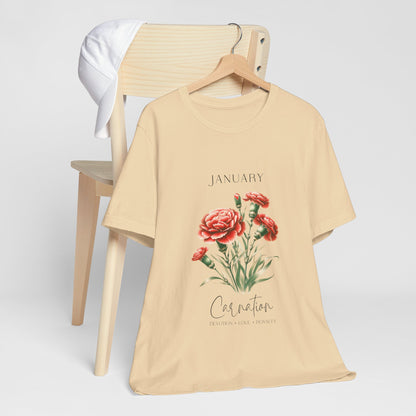 A t-shirt featuring a beautiful carnation for January with traits Devotion, Love, Loyalty. Perfect for January birthdays and floral art lovers. Comfortable and stylish for casual outings or celebrations. Bella+Canvas 3001 t-shirt in soft cream. ReadyShirtAim.com