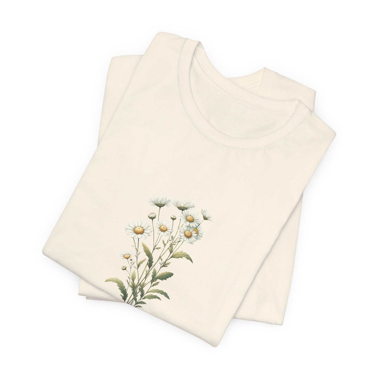 A t-shirt featuring a beautiful daisy for April with the quote “You were made to bloom.” Perfect for April birthdays and floral art lovers. Comfortable and stylish for casual outings or celebrations. Bella+Canvas 3001 t-shirt in natural. ReadyShirtAim.com