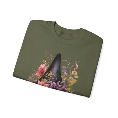 Whimsical Witch Hat Sweatshirt with a watercolor illustration of a black witch hat surrounded by flowers in purple, pink, and green.. Available in multiple dark and light colors and sizes. Gildan 18000 sweatshirt in Military Green. ReadyShirtAim.com