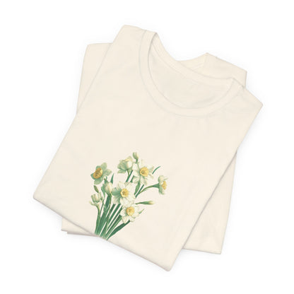 A t-shirt featuring a beautiful narcissus for December with the quote “Peaceful mind, grateful heart.” Perfect for December birthdays and floral art lovers. Comfortable and stylish for casual outings or celebrations. Bella+Canvas 3001 t-shirt in natural. ReadyShirtAim.com