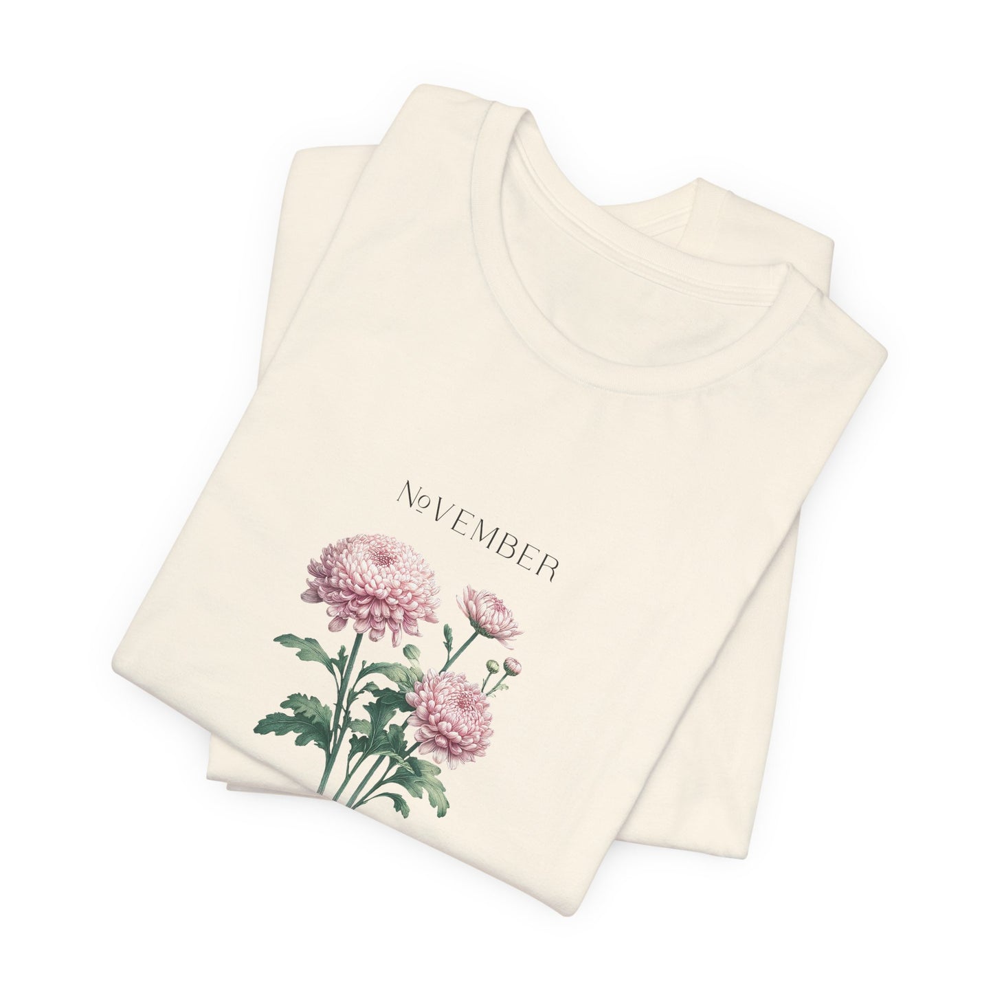 A t-shirt featuring a beautiful chrysanthemum for November with traits Longevity, Optimism, Joy. Perfect for November birthdays and floral art lovers. Comfortable and stylish for casual outings or celebrations. Bella+Canvas 3001 t-shirt in natural. ReadyShirtAim.com