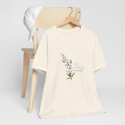 A t-shirt featuring a beautiful larkspur for July with the quote “Life is a collection of moments.” Perfect for July birthdays and floral art lovers. Comfortable and stylish for casual outings or celebrations. Bella+Canvas 3001 t-shirt in natural. ReadyShirtAim.com