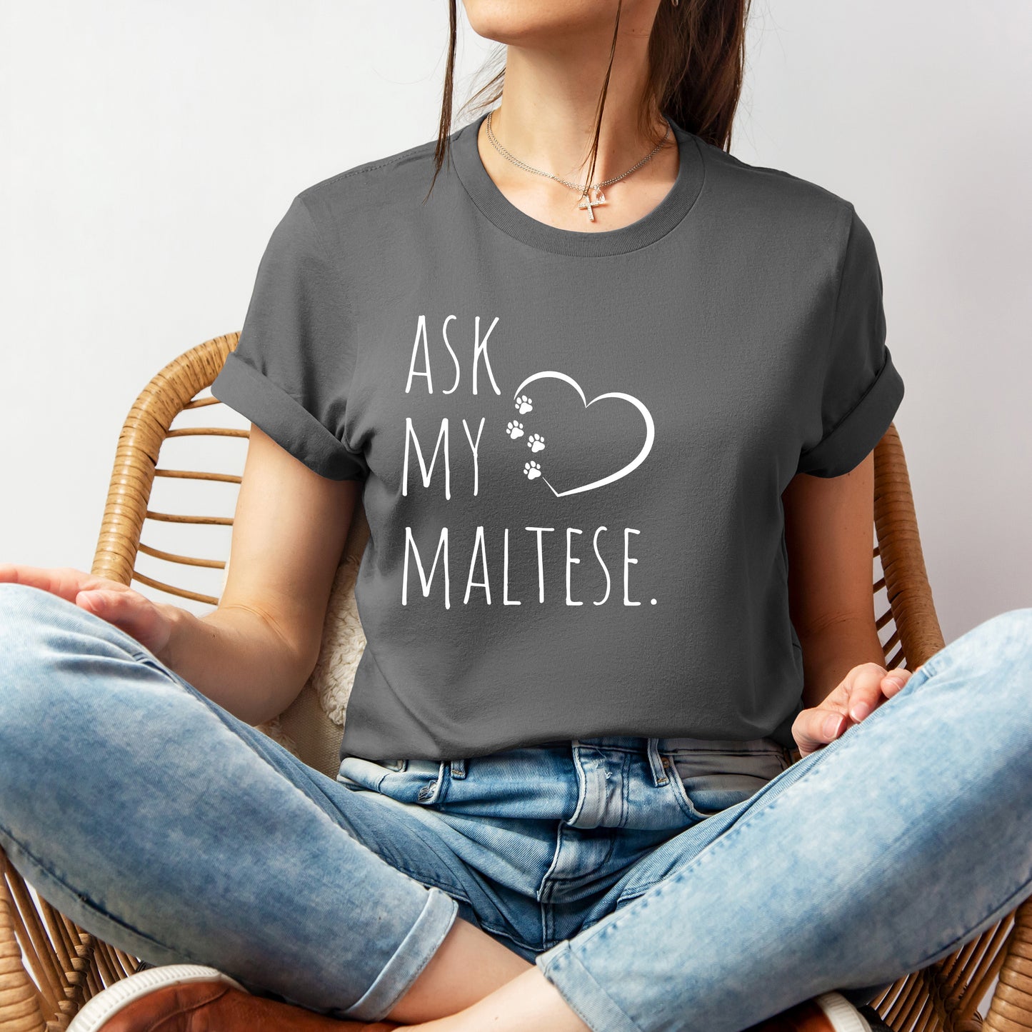 "Ask My Maltese" T-Shirt featuring a heart with two paw prints, perfect for dog lovers and Maltese owners. Unisex design for men and women. Available in multiple colors and sizes. Bella+Canvas 3001 t-shirt in asphalt. ReadyShirtAim.com