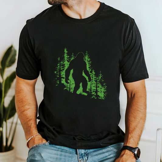 A t-shirt featuring a silhouette of Bigfoot walking in the woods in shades of green, perfect for cryptid enthusiasts, outdoor adventurers, and mystery lovers. Comfortable and stylish for casual outings or cryptid conventions. Bella+Canvas 3001 t-shirt in black. ReadyShirtAim.com