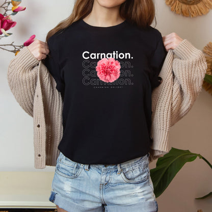 A photo-realistic pink carnation t-shirt with a bold contemporary floral design and the caption "Charming Delight." Perfect for carnation lovers, botanical enthusiasts, and nature lovers. Bella+Canvas 3001 t-shirt in black. ReadyShirtAim.com