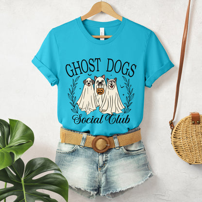 "Ghost Dogs Social Club" Women's T-Shirt featuring playful dogs in ghost costumes and trick or treating, perfect for Halloween in muted neutral tones.  Available in multiple colors and sizes.  Bella+Canvas 3001 t-shirt in turquoise. ReadyShirtAim.com