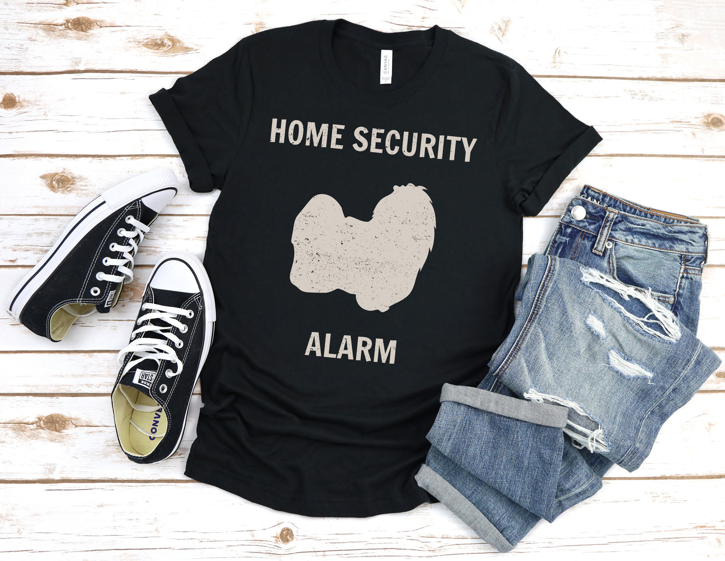 Funny Dog Lovers T-Shirt with an adorable Maltese illustration and "home security alarm" text, perfect for Maltese moms and fur baby parents. Unisex fit for men and women. Available in multiple colors and sizes. Bella+Canvas 3001 t-shirt in black. ReadyShirtAim.com