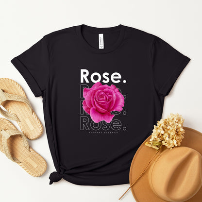 A t-shirt featuring a stunning bright pink watercolor rose with the theme 'Vibrant Essence.' Perfect for those who adore bold floral art and nature. Comfortable and stylish for casual outings or celebrations. Bella+Canvas 3001 t-shirt in black. ReadyShirtAim.com