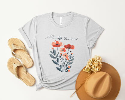 A Boho Scandinavian floral t-shirt with a simple flower design and the caption "Bee Kind." Perfect for compassionate souls, garden lovers, and nature enthusiasts. Bella+Canvas 3001 t-shirt in ash. ReadyShirtAim.com