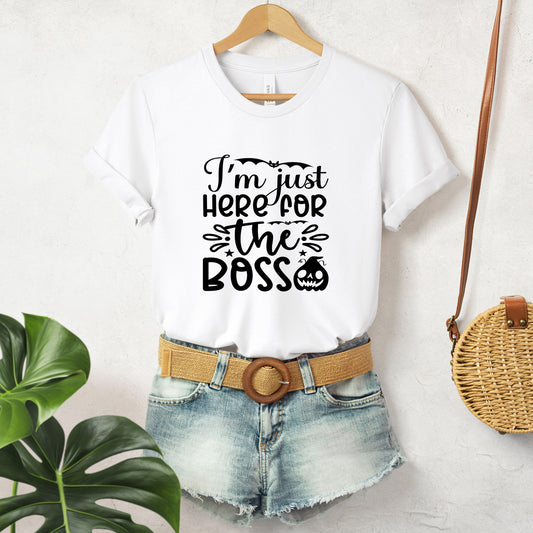 "I'm Just Here for the Boos" Funny and Sarcastic Halloween Unisex T-Shirt featuring bold black text, perfect for adding a humorous and witty touch to your Halloween festivities.